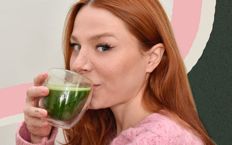 Women drinking matcha tea from glass cup