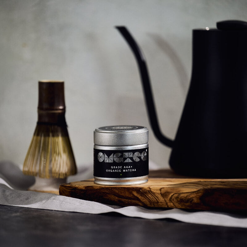 OMGTea matcha tea with whisk and black teapot