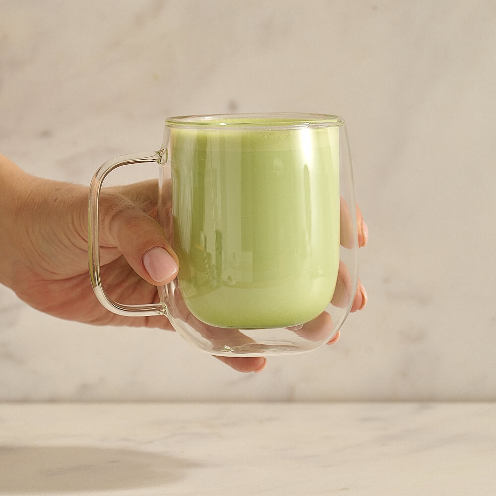 Match tea in glass mug