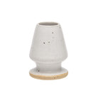 Matcha whisk stand on white background