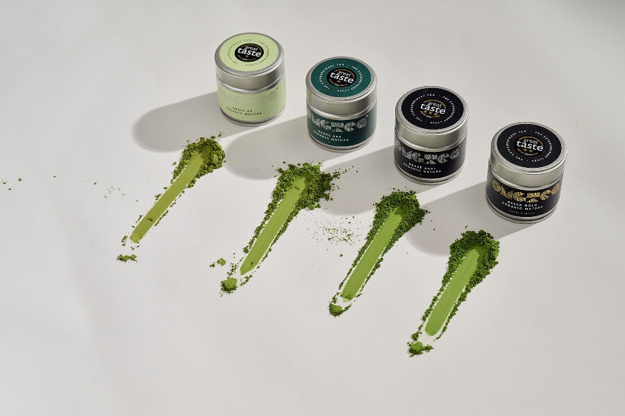 matcha tea tins with smudges of matcha